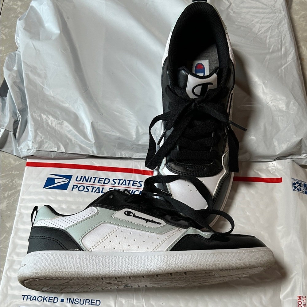 Champion Black and White boys tennis shoes size 5. Like new